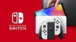 Nintendo Switch (modelo OLED) con base y mandos Joy-Con blancos - Imagen 2